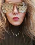 Home Woman wearing sunglasses